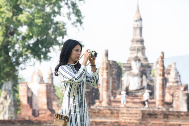 istock Asian tourists is visiting at Sukhothai in Thailand. 1370405966