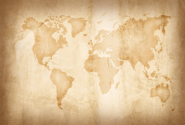 istock World map on an old paper texture background with space for text wind sea marine navigation. Design retro nautical template for marine theme border frame. 1370408561