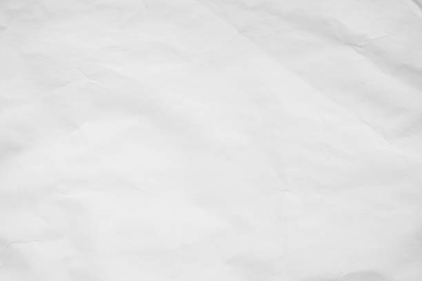 istock White recycled craft paper background. Abstract grey material texture old vintage page, grunge vignette of newspaper sheet. Pattern rough parchment crease grunge letter with copy space for text. 1370408571