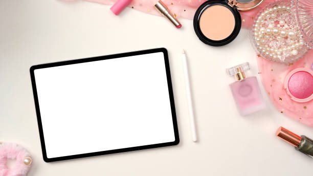 istock Female workspace, feminine office desk with tablet white screen mockup 1370409790
