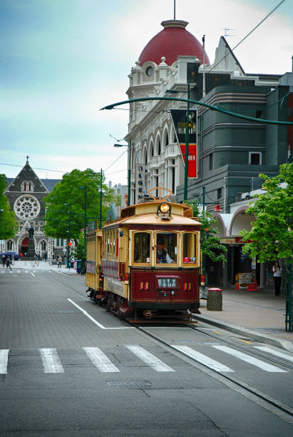 Old tram and Christchurch Cathedral before damaged in the earthquakes in New Zealand Old tram and Christchurch Cathedral before damaged in the earthquakes in New Zealand christchurch earthquake stock pictures, royalty-free photos & images