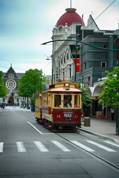 Photo of Old tram and Christchurch Cathedral before damaged in the earthquakes in New Zealand