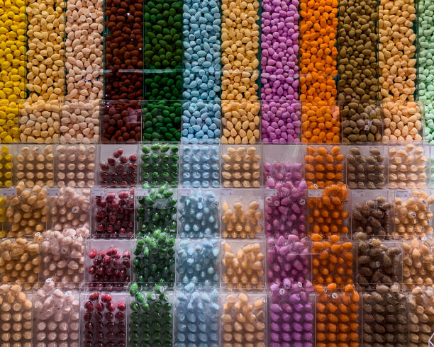 pile of beauty blenders with various colors on a glass shelf