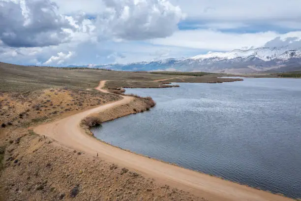 early spring aerial view of North Park in Colorado - Meadow Creek Reservoir and Medicine Bow Mountains