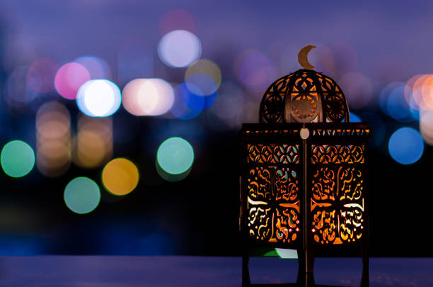 istock Lantern with night sky and city bokeh light background 1370413959
