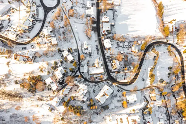 A snow-covered resort town in Poland from a bird's eye view. Winter landscape from above. Karpacz, Poland