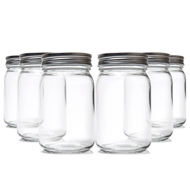 istock Glass mason jars on white background 1370418940