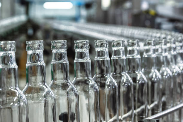 istock Production line transports empty glass bottles for alcohol 1370420146