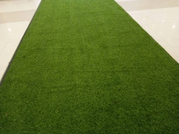istock A green grass carpet to spread on the floor 1370425709