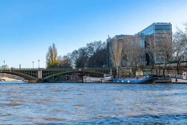 Paris, the Sully bridge on the Seine, and the Institut du monde arabe in background