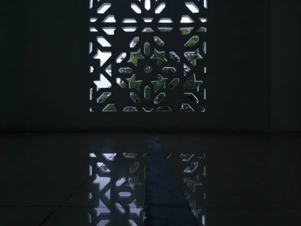 istock Dark space at mosque with geometric ornament at wall 1370428750