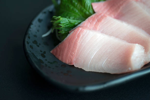 Fresh yellowtail sashimi Fresh yellowtail sashimi shiso photos stock pictures, royalty-free photos & images