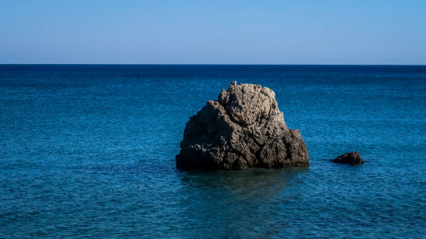 istock Big stone in Libyan Sea with calm sea 1370431461