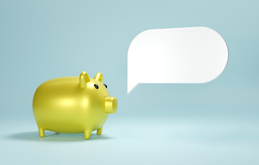 Piggy Bank And Blank White Speech Bubble On Blue Background. Save Money And Investment Concept.