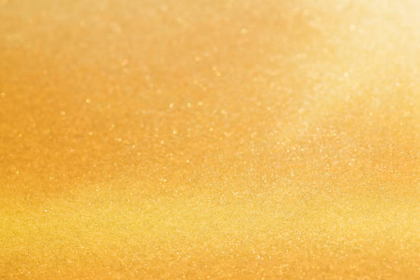 istock Glitter Golden Lights Defocused Background 1370434141