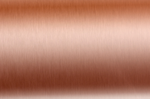 A plate of brushed copper.