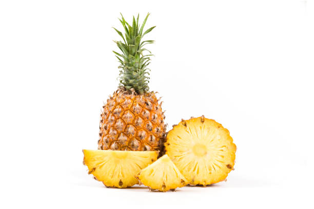 istock Sliced and whole of pineapple (Ananas comosus) isolated on white background 1370439682