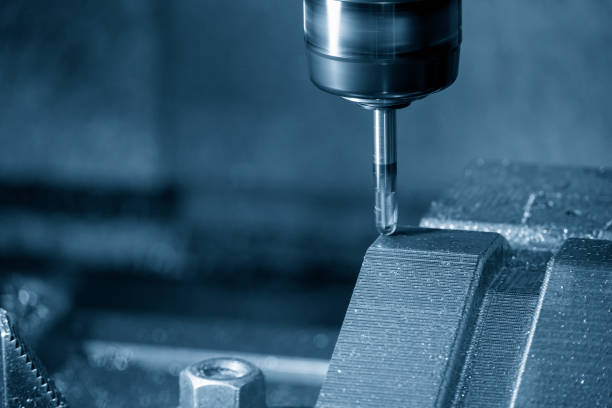 istock Closeup scene the press die manufacturing process by CNC milling machine with ball end mill tool. 1370442490