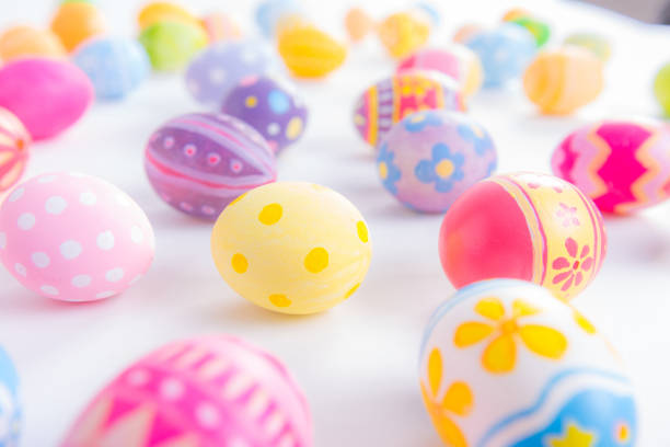 Happy Easter day colorful eggs and blurred on white background with copy space.