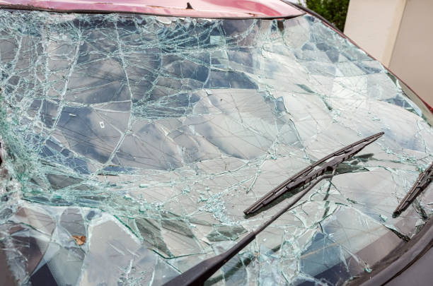 istock Splintered windshield of a car after an accident 1370452897