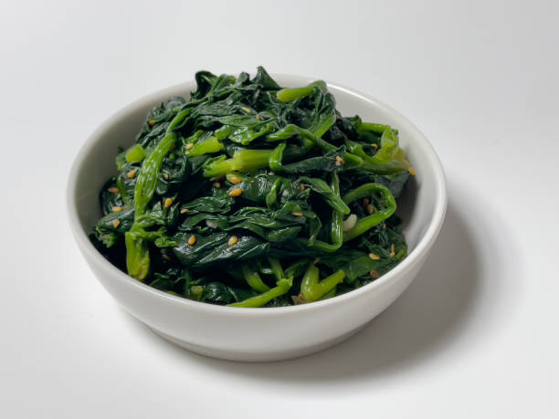 istock Seasoned Spinach in a white bowl 1370454544