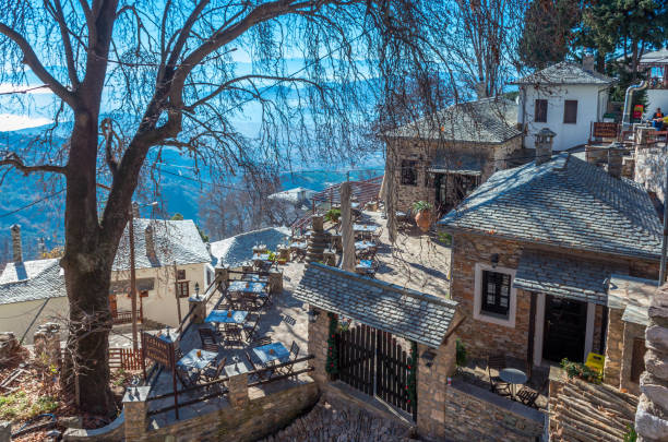Traditional village of Makrinitsa Makrinitsa Greece, January 1 2022- Traditional village of Makrinitsa with the stone built houses and the picturesque square, lies on the slopes of Pelion. pilio greece stock pictures, royalty-free photos & images