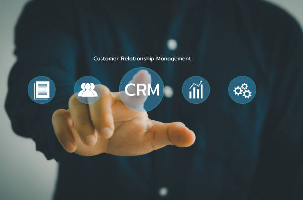 istock Hand touching CRM  Customer relationship management automation system software.business technology on virtual screen concept. 1370455425