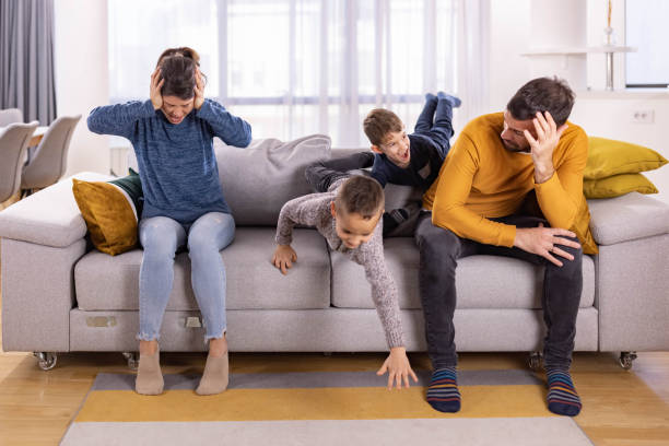 istock Frustrated parents feeling exhausted of their mischief sons. 1370456214