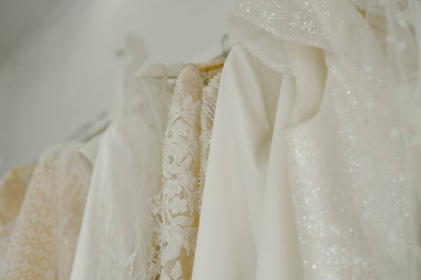 istock Wedding salon with designer dresses. Beautiful designer dresses. 1370456335