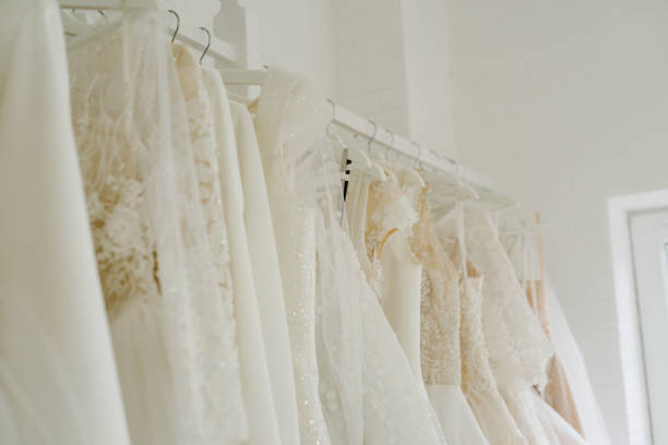 istock Wedding salon with designer dresses. Beautiful designer dresses. 1370456343
