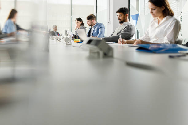 istock Business people working on a meeting in board room. 1370456679