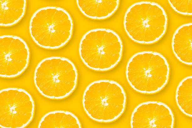 fondo plano de color naranja en rodajas - vitamin c fotografías e imágenes de stock