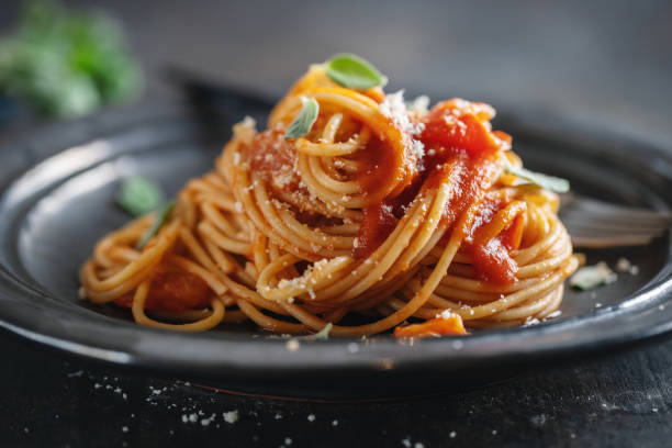 Pasta with spaghetti sauce and cheese stock photo