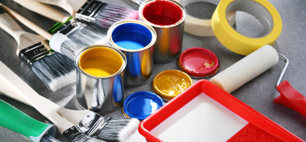 istock Paintbrushes of different size and paint cans 1370458212