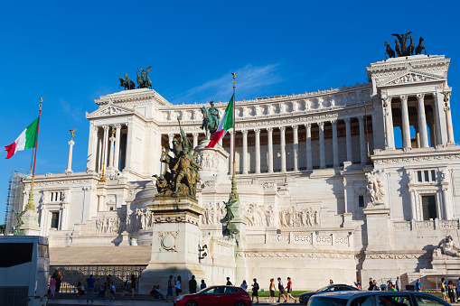 Rome, Italy, June 26, 2014: Tourist explore the Victor Emmanuel II National Monument, built between 1885 and 1935 to honor Victor Emmanuel II, the first king of a unified Italy.