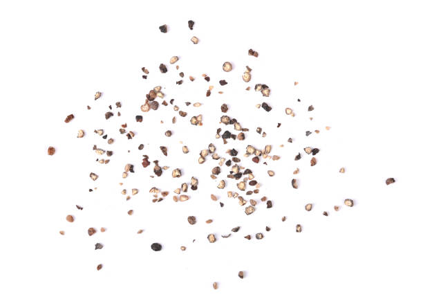 Ground black pepper isolated on a white background .Top view