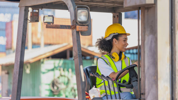 istock Young African American mechanical engineer with forklift 1370462661