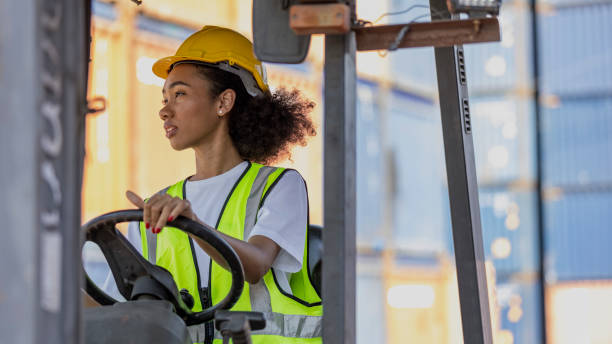 istock Young African American mechanical engineer with forklift 1370462662