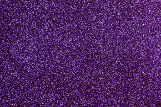 istock Violet glitter texture. Purple sparkle background. Holiday abstract glitter background with blinking lights. 1370463248