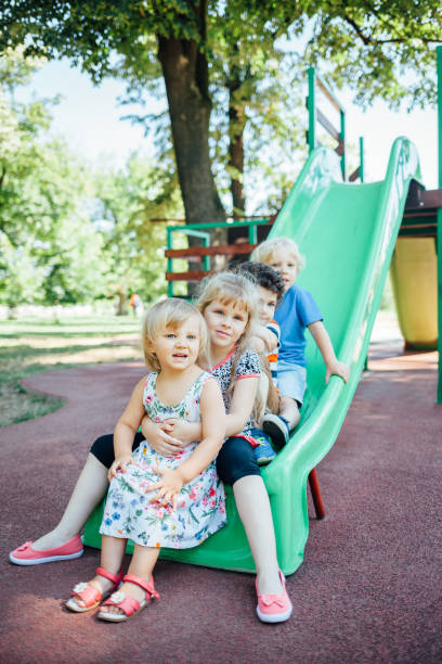 istock Happy Kids Playing Outdoors 1370466644