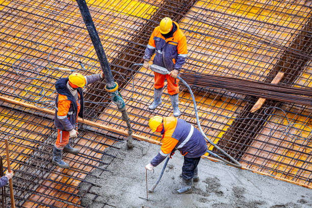istock Concrete pouring on the construction site. 1370467177
