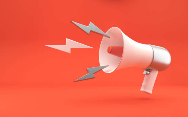 istock Megaphone with with loud voice symbols and copy space on bright red background. 3d rendering. 1370467384