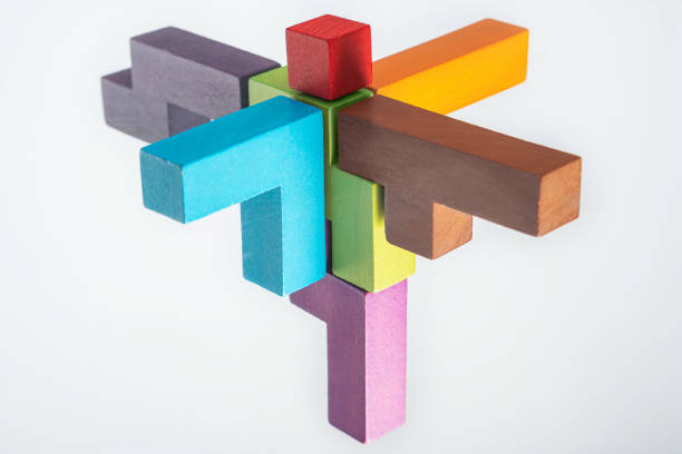 istock Abstract construction from wooden blocks. The concept of logical thinking. 1370468560