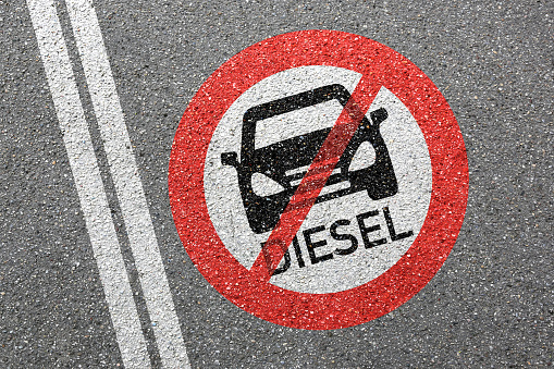 Diesel driving ban sign road street car no not allowed forbidden zone concept