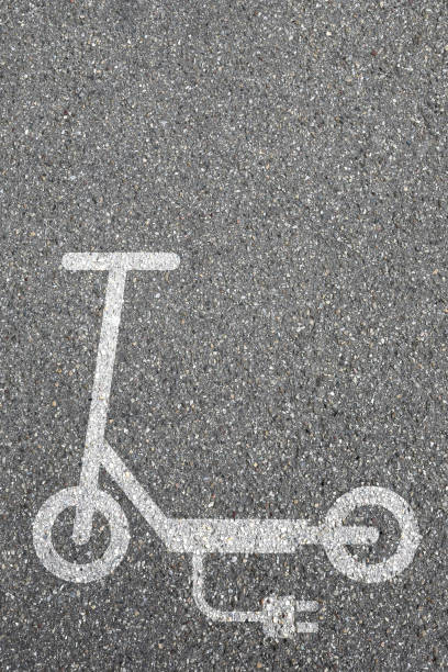 istock Electric scooter e-scooter road sign eco friendly portrait format copyspace mobility city transport 1370471870