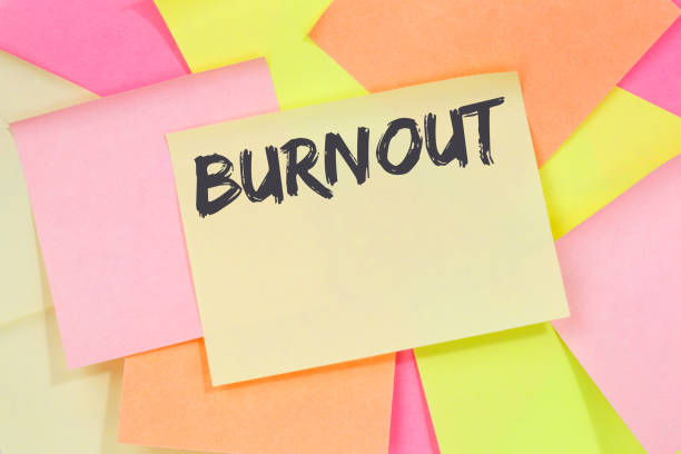 Burnout ill illness stress stressed at work business concept note paper notepaper