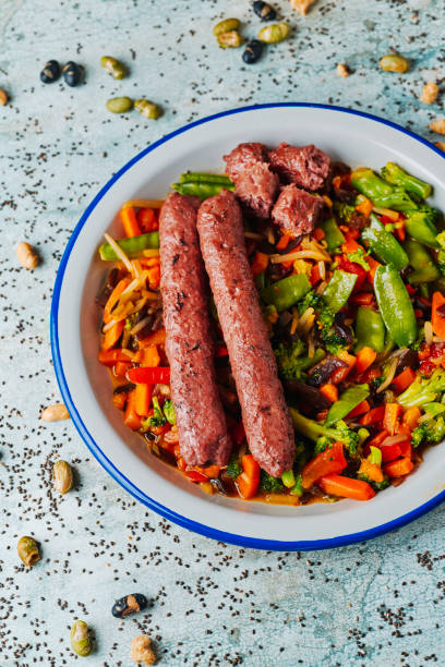 istock fried veggie sausages and grilled vegetables 1370473656