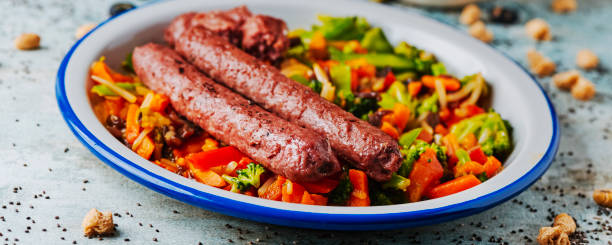 istock veggie sausages and grilled vegetables, web banner 1370473661