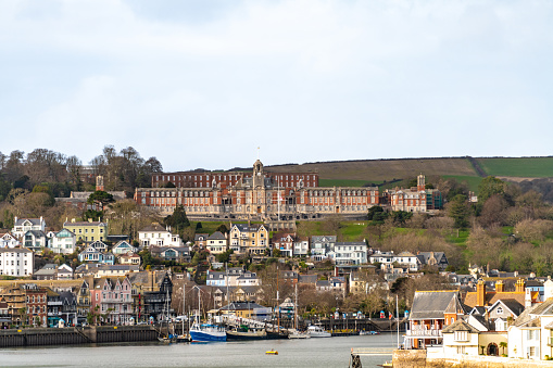 Naval college building and town of Dartmouth in Devon, UK