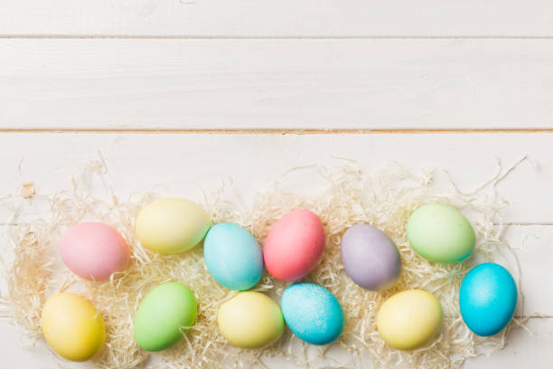 istock holiday preparation Multi colors Easter eggs on colored background . Pastel color Easter eggs. holiday concept with copy space 1370476455